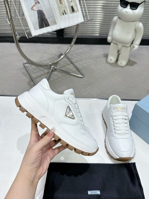 2025 Women Prada White Cow Leather Lambskin Sneakers KFY00310